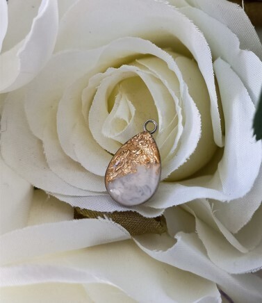 Necklace with breast milk drop pendant with gold leaf pieces
