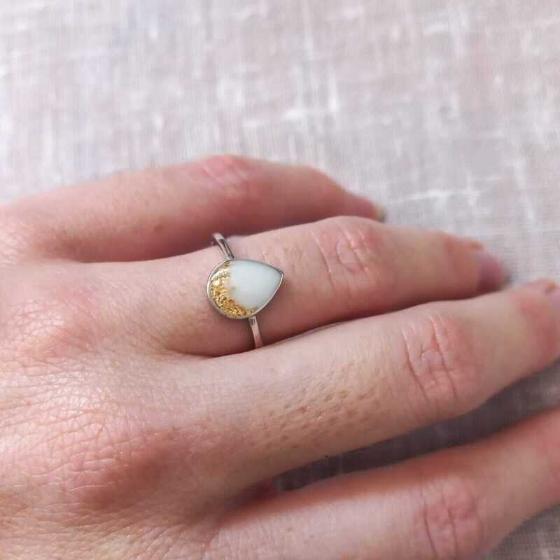 Drop ring with breast milk and gold leaf pieces