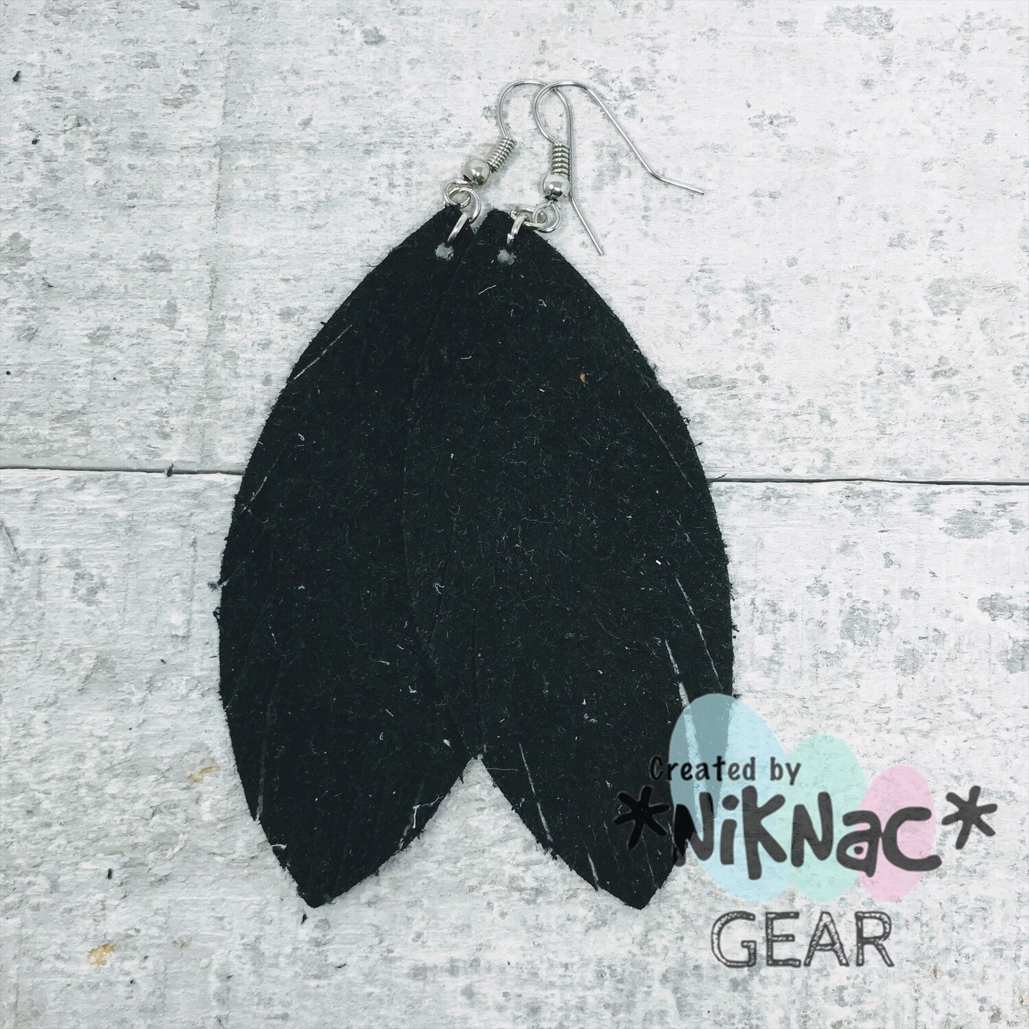 Rough Black Suede Feathers