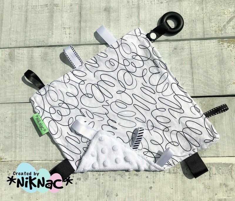 Taggie Teether Squiggles White Back