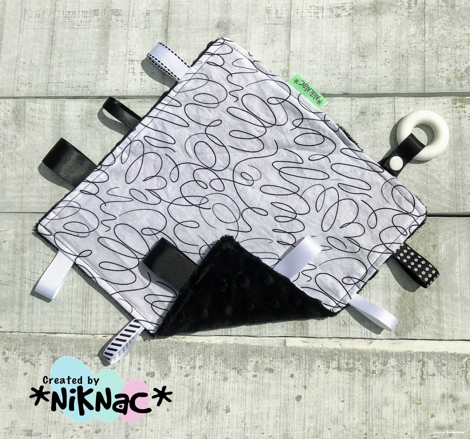 Taggie Teether Squiggles Black Back