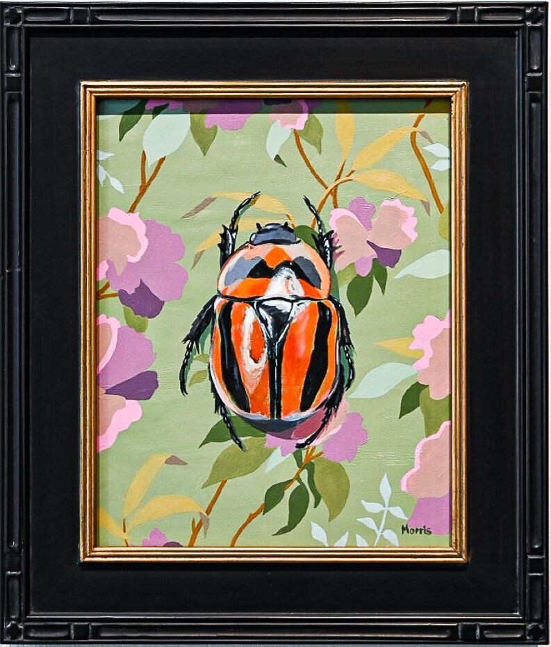 Orange and Black Beetle on Green Floral