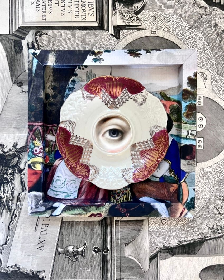 LOVER'S EYE PAINTING ON A DEEP PINK, GOLD, AND WHITE PLATE