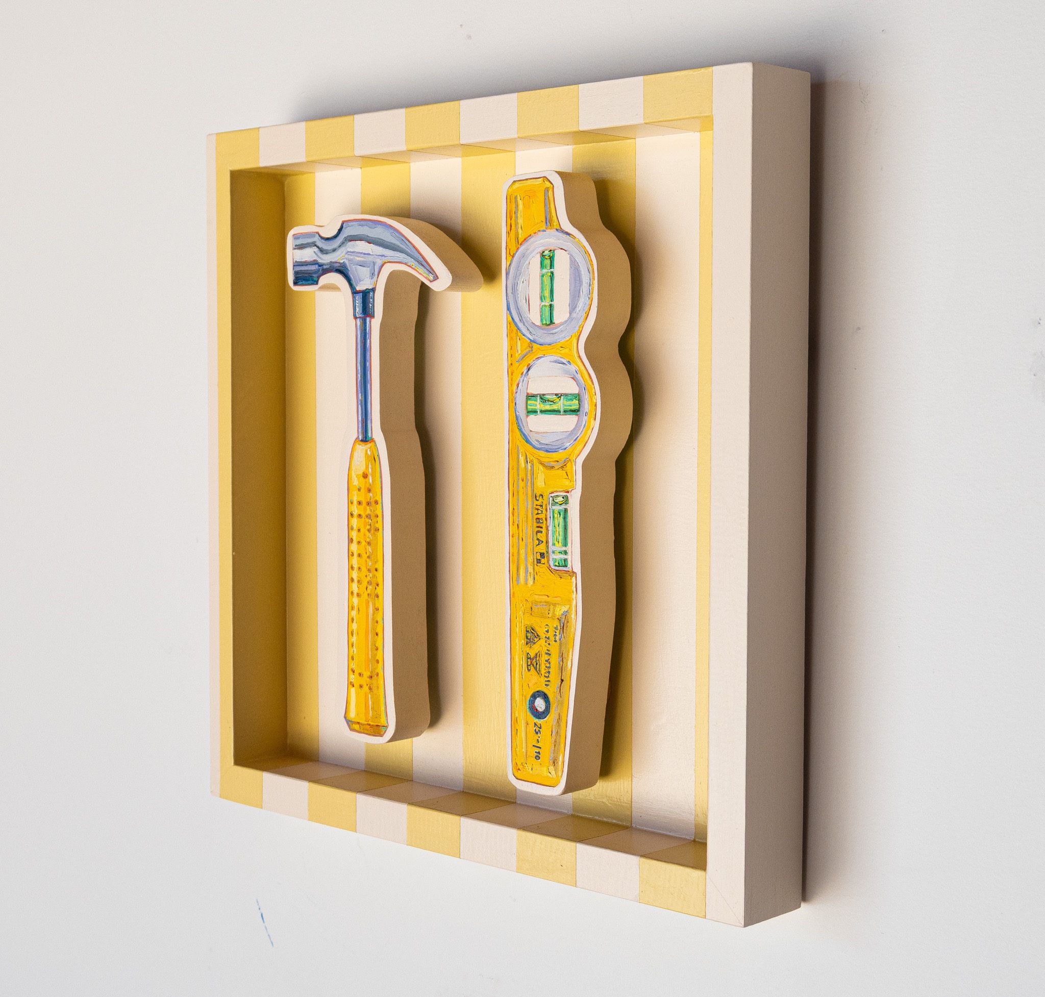 Hammer and Level on Cream & Butter