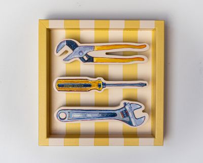 Wrenches and Screwdriver on Cream & Butter