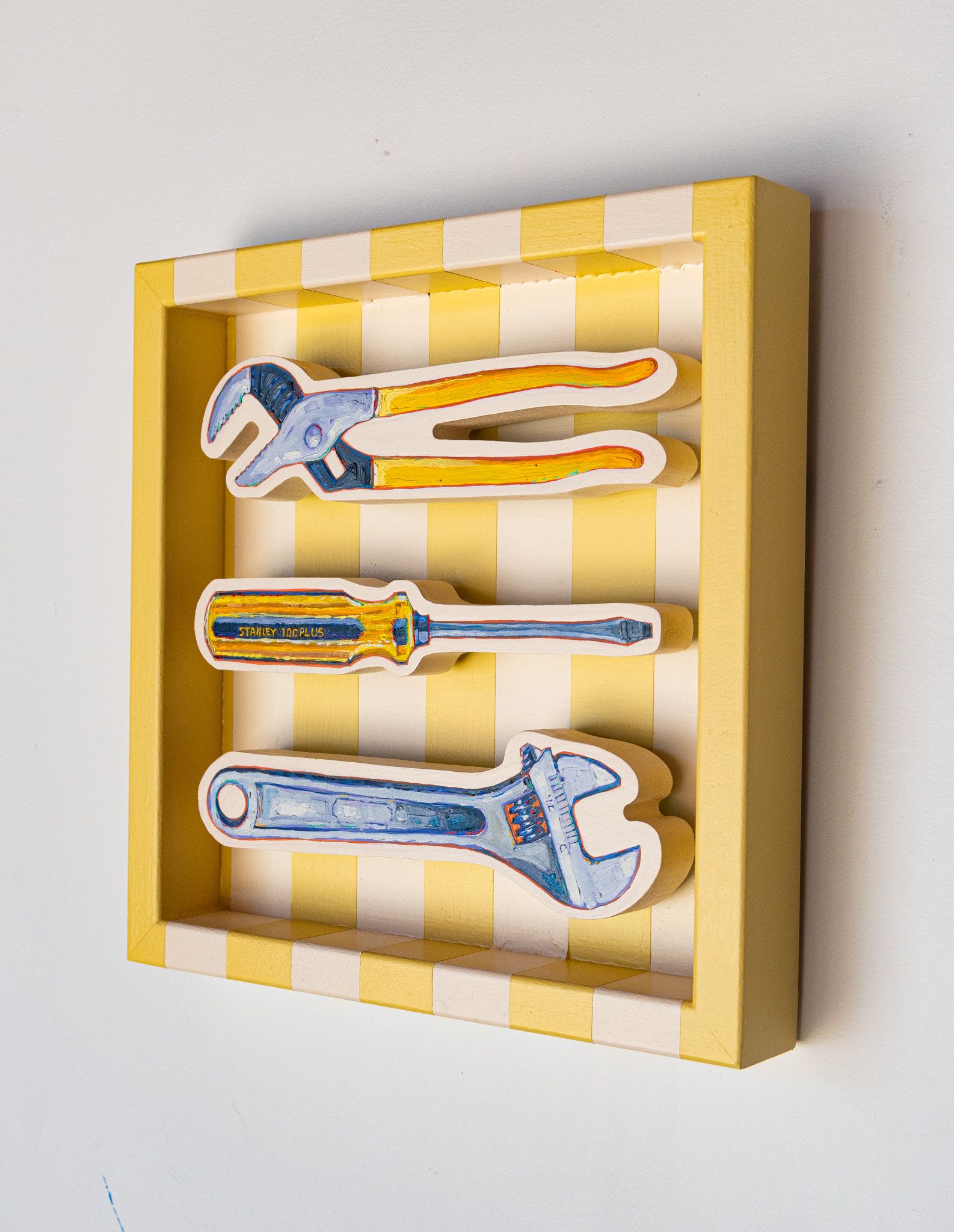 Wrenches and Screwdriver on Cream & Butter