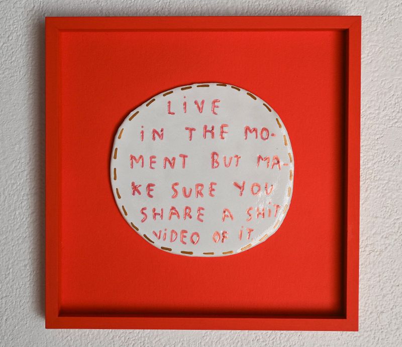 Live in the moment. But make sure you share a shit video of it.