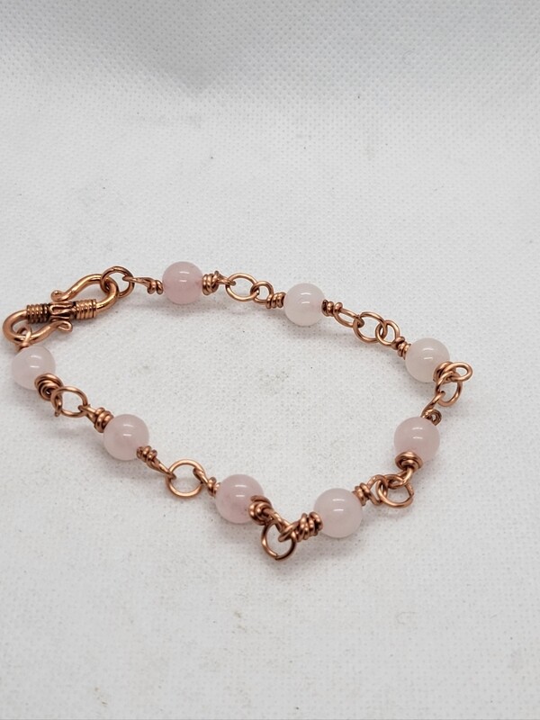 Rose quartz and copper link bracelet