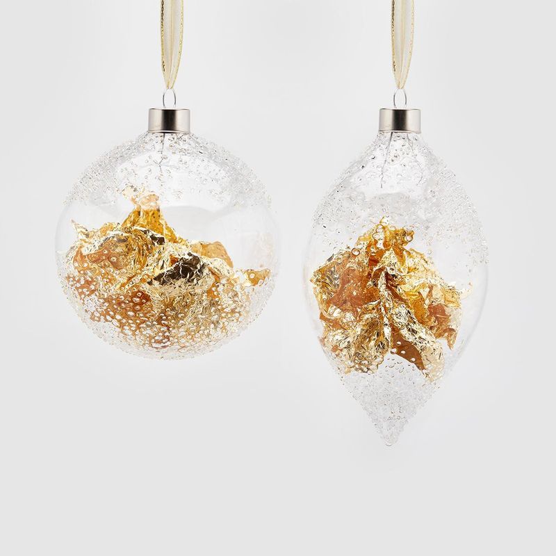Sfera e fuso foglia oro