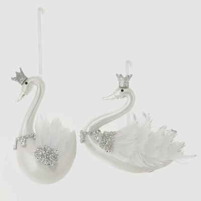 Cigno con corona e piume