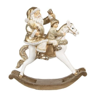 Babbo natale con bambino su cavallo a dondolo