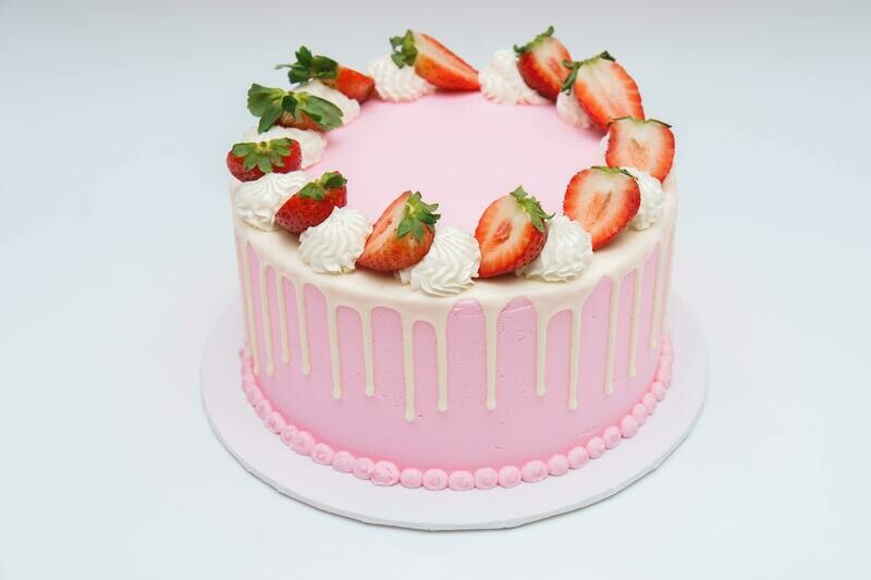 Sliced Strawberry Topped Drip Cake