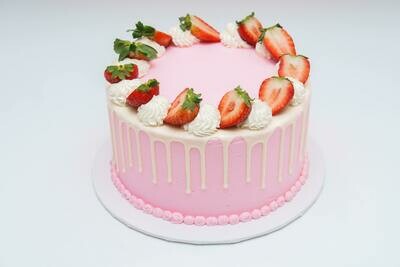 Sliced Strawberry Topped Drip Cake