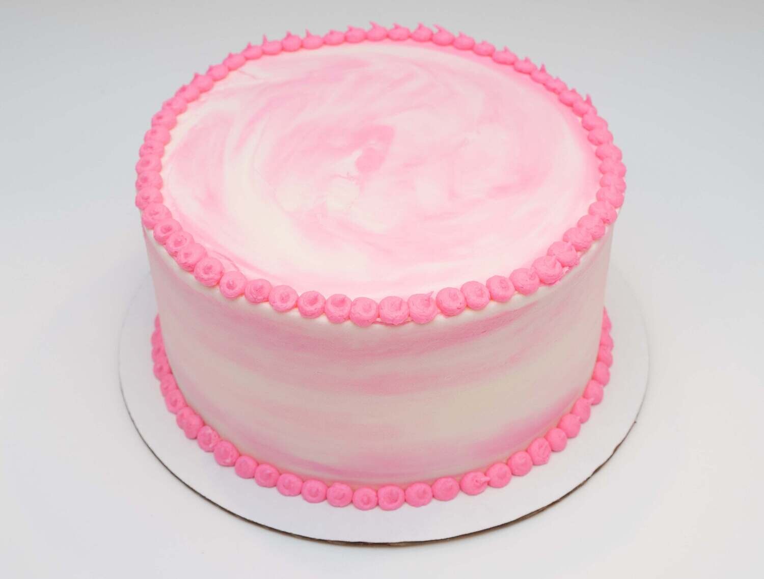 Pink on White Swirl Cake