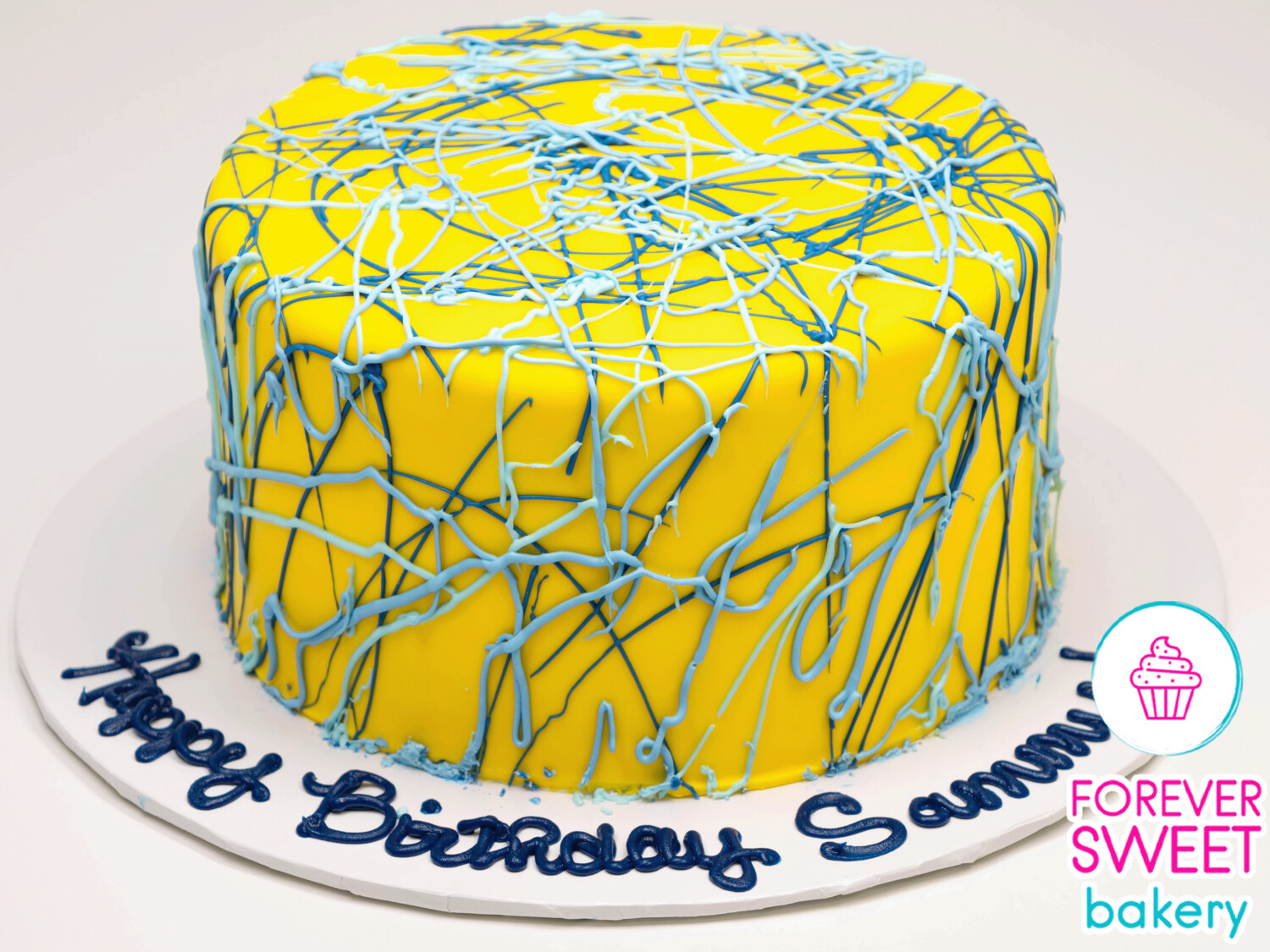 Blue Splatter on Yellow Fondant Cake