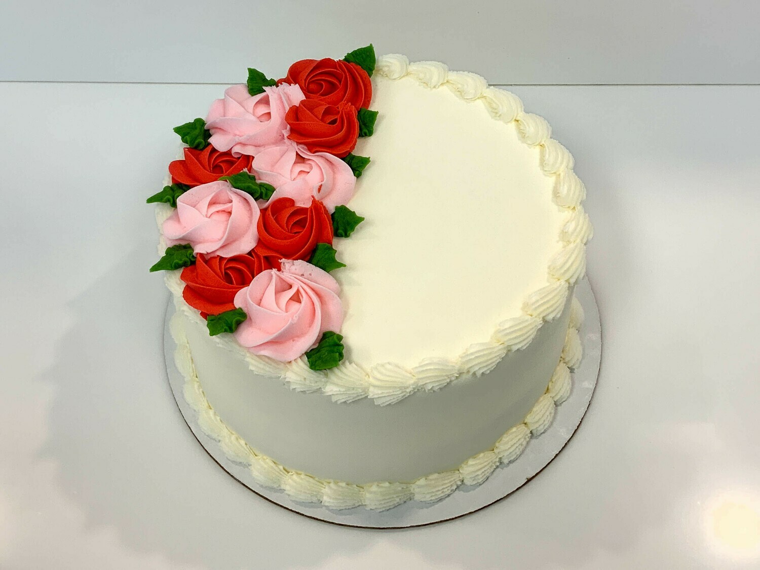 Rosette Spray Decorated Cake, Rosette Colors: Pink and Red