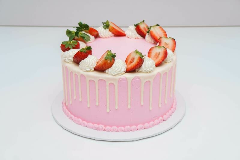Sliced Strawberry Topped Drip Cake