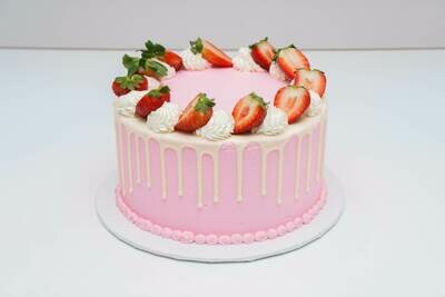 Sliced Strawberry Topped Drip Cake