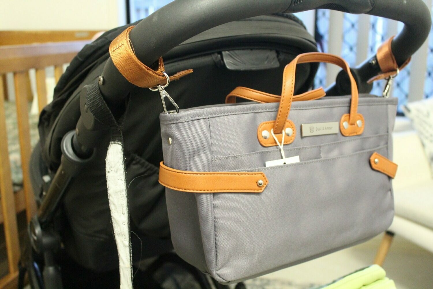 grey and tan pram
