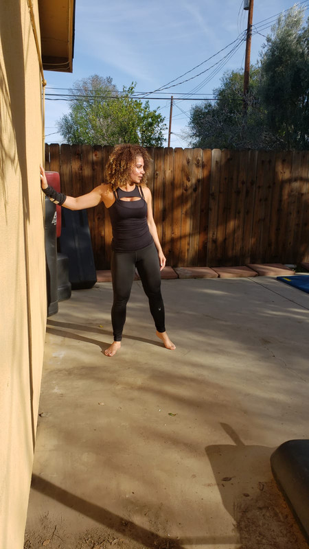 Goddess JAS stretching and kicking preparing for her next session !!
