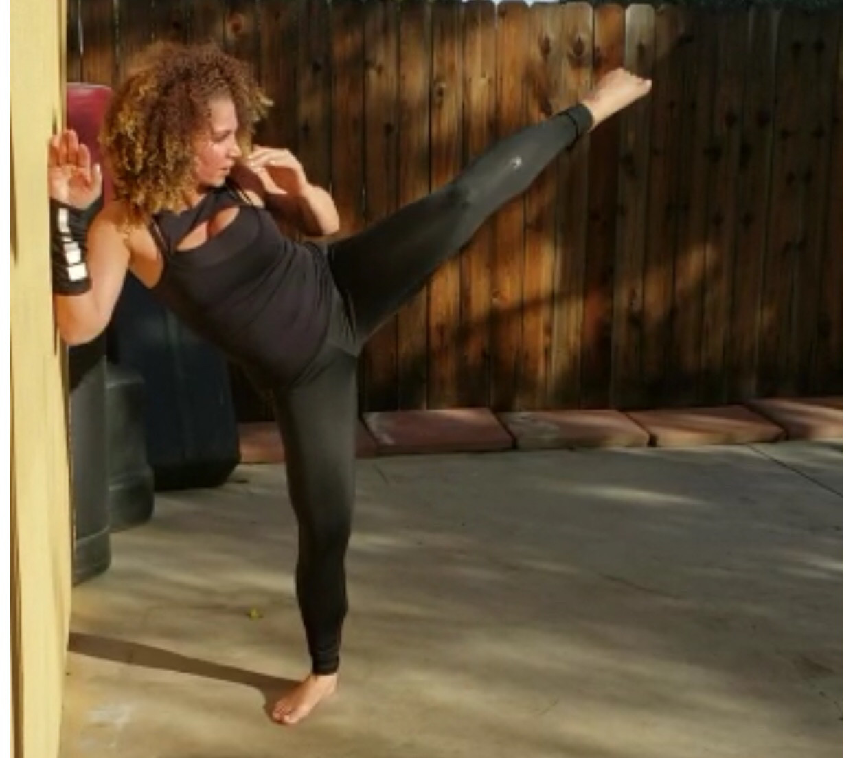 Goddess JAS stretching and kicking preparing for her next session !!