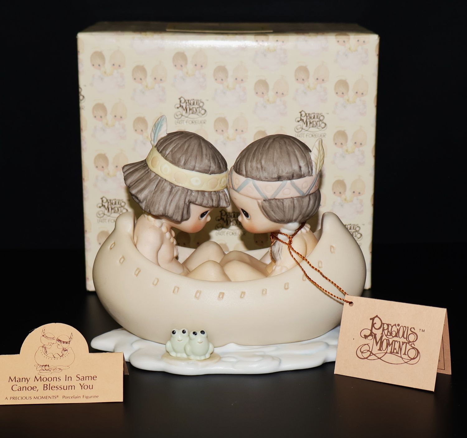 Precious Moments 1988 Figurine #520772 – “Many Moons in Same Canoe, Blessum You” (With Box)
