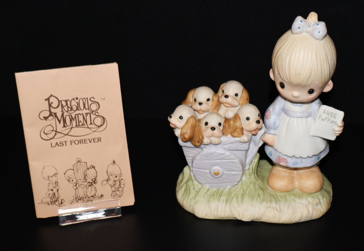 Precious Moments 1977 Figurine – “God Loveth A Cheerful Giver” (Free Puppies)