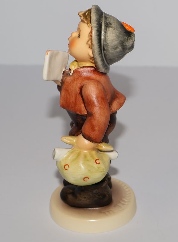 Hummel “A Free Flight” Boy holding Ticket Figurine - TMK-7 | #569 | First Issue 1993