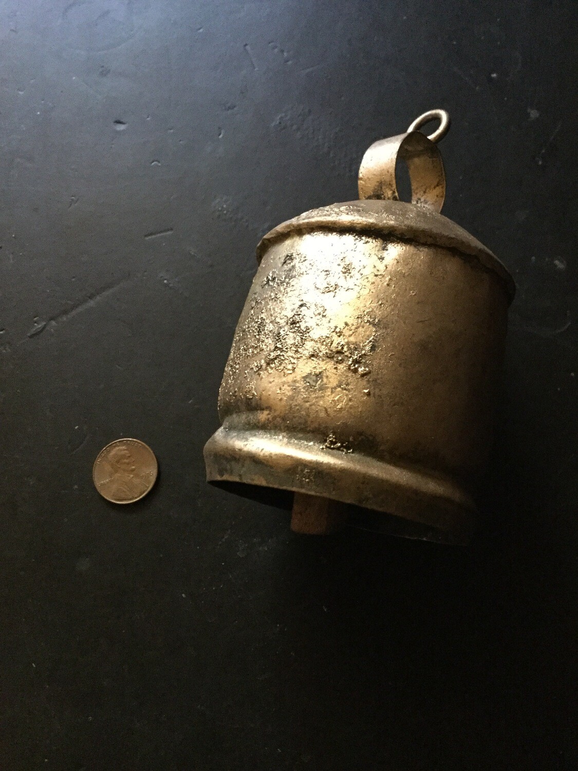 Metal bell spell cast emits anointing of emotional freedom
