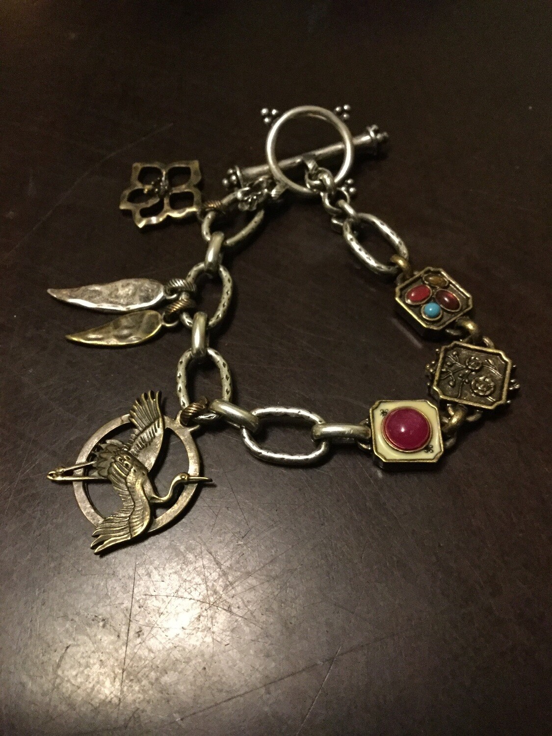 Charm bracelet enchantments of mental clarity, emotional release and spiritual freedom