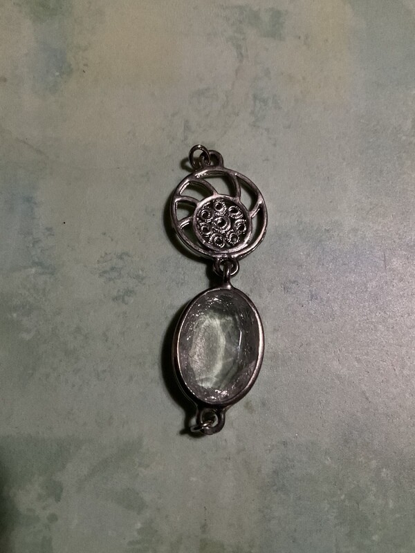 Talisman to enable / empower a spirit to be more evident, visual displays of presence and conveyed words spoken
