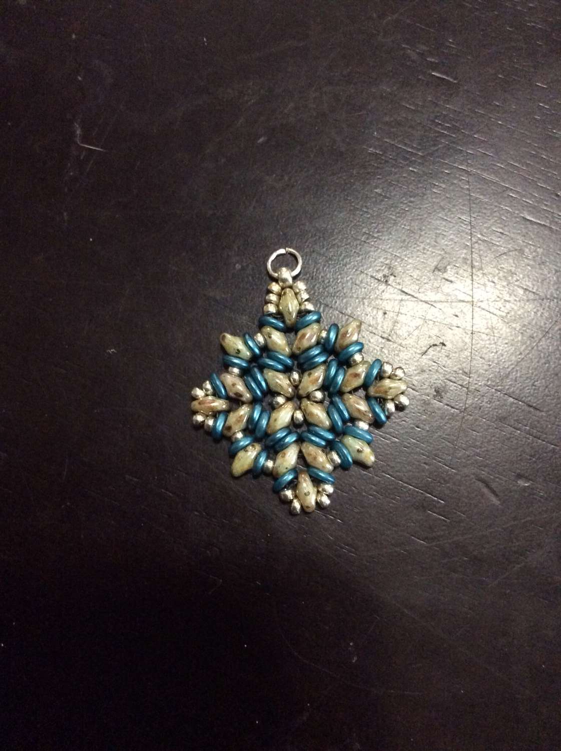 Small beaded charm anointed with sacred Bethesda incantations
