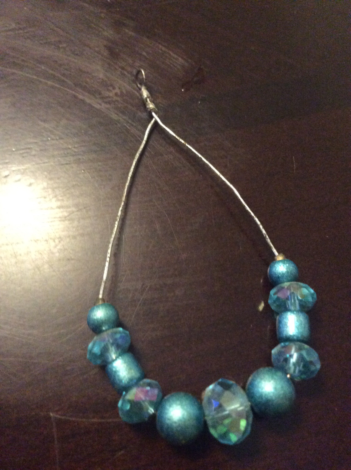 Wire charm with beads increase energy balance and flow through Dwelling 