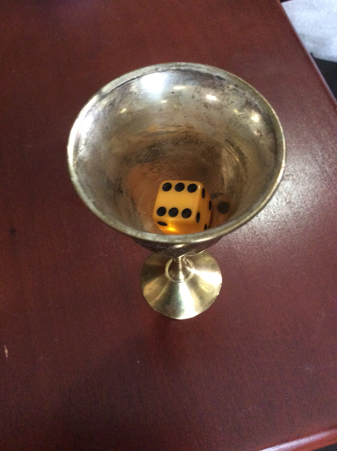 Enchanted dice and small chalice anoint improve odds of good luck to be a winner 