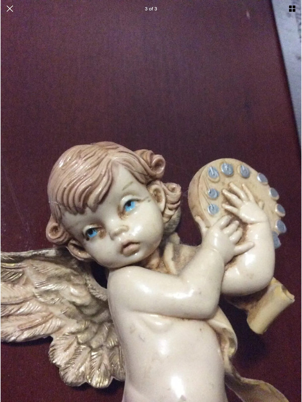 Cherub figure angelic essence anointing of praise glory worship sacred, holy sanctity 