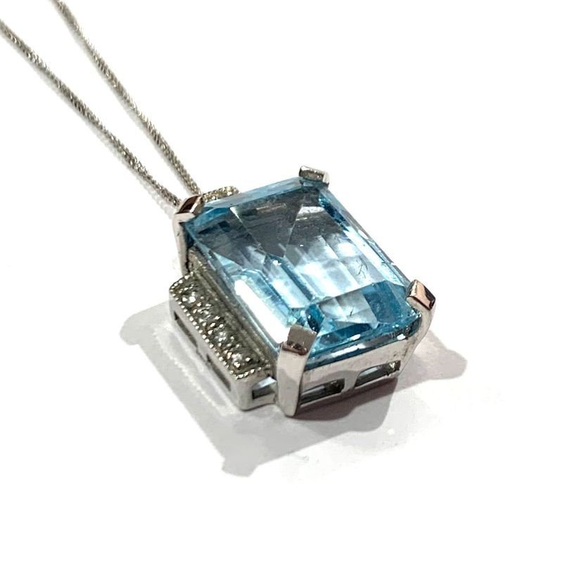 New 9ct White Gold Blue Topaz and Diamond Pendant