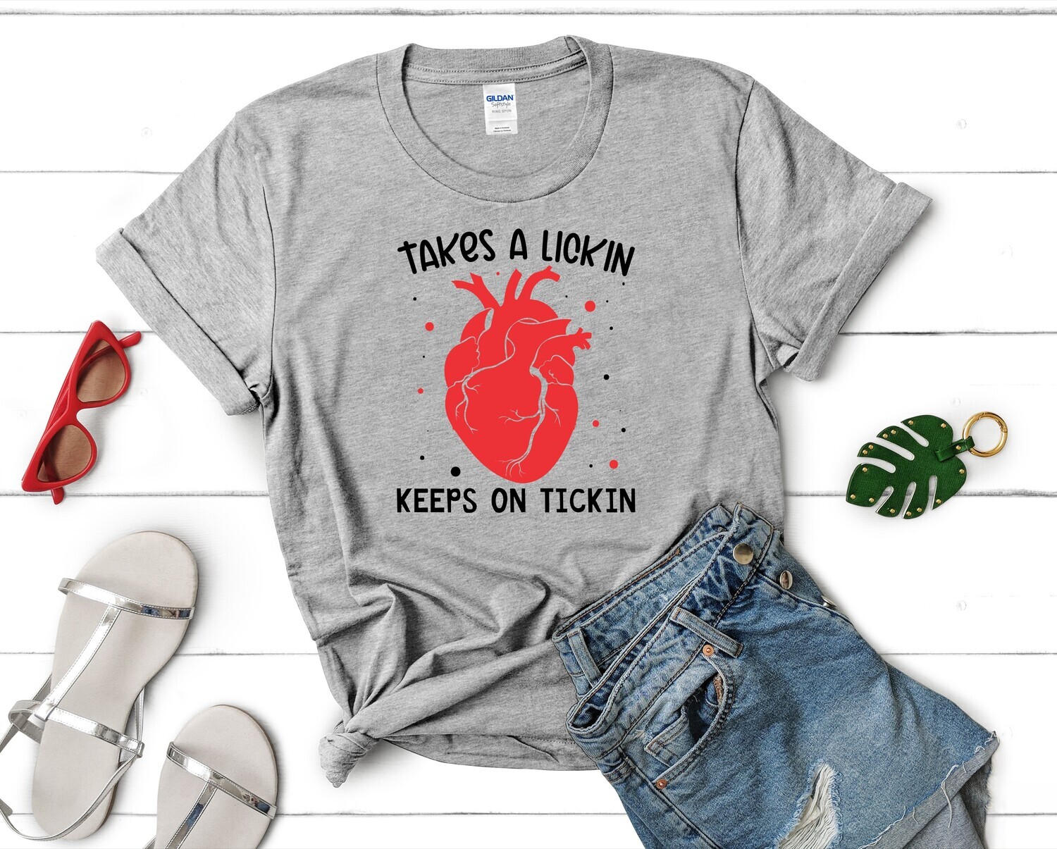 Takes A Lickin Keeps On Tickin DTF Transfer