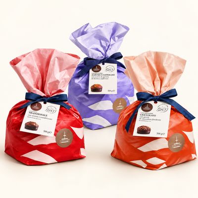 Fiasconaro panettone in red, lilac and orange gift wrapping with navy ribbons