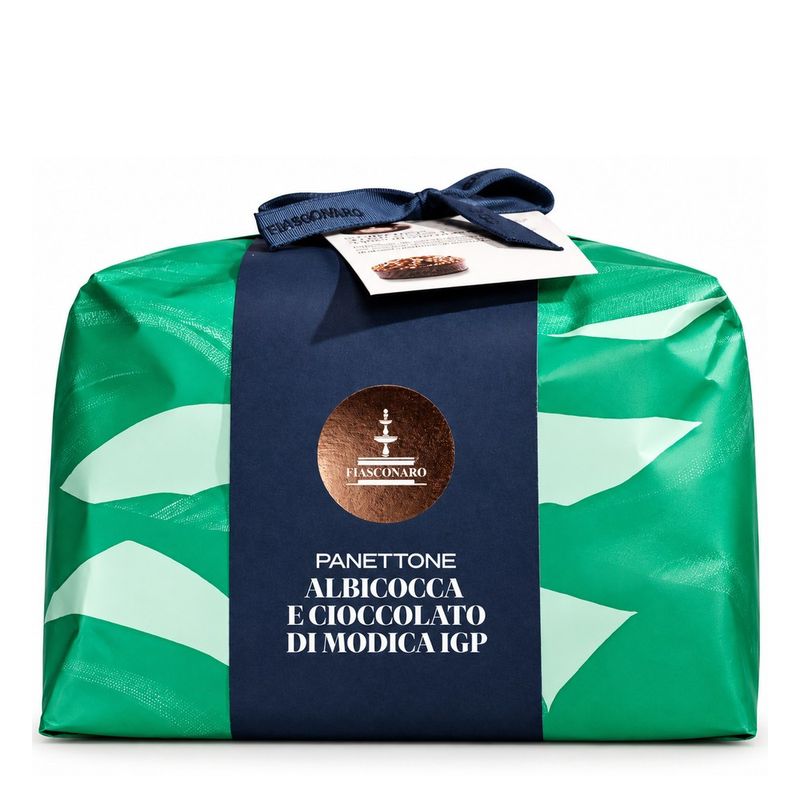 Fiasconaro Apricot and Modica Chocolate IGP Panettone 1kg in green and mint wrapping with a navy band and bow.