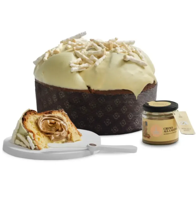 Fiasconaro Oro di Manna panettone with a slice, manna cream jar and spreader