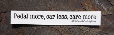 Eerder metaal transparant sticker : Pedal more, car less, care more /#ThisPlanetIsOurOnlyHome . size Large