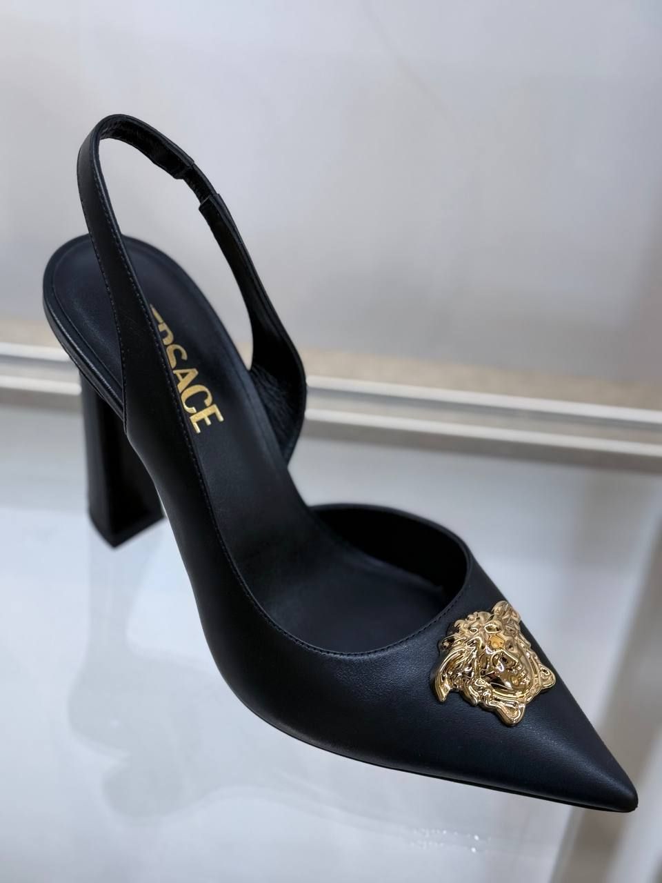 Слингбэки Versace