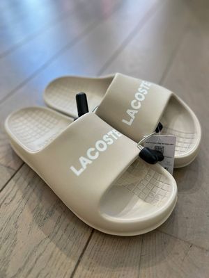 Женские шлепанцы Lacoste