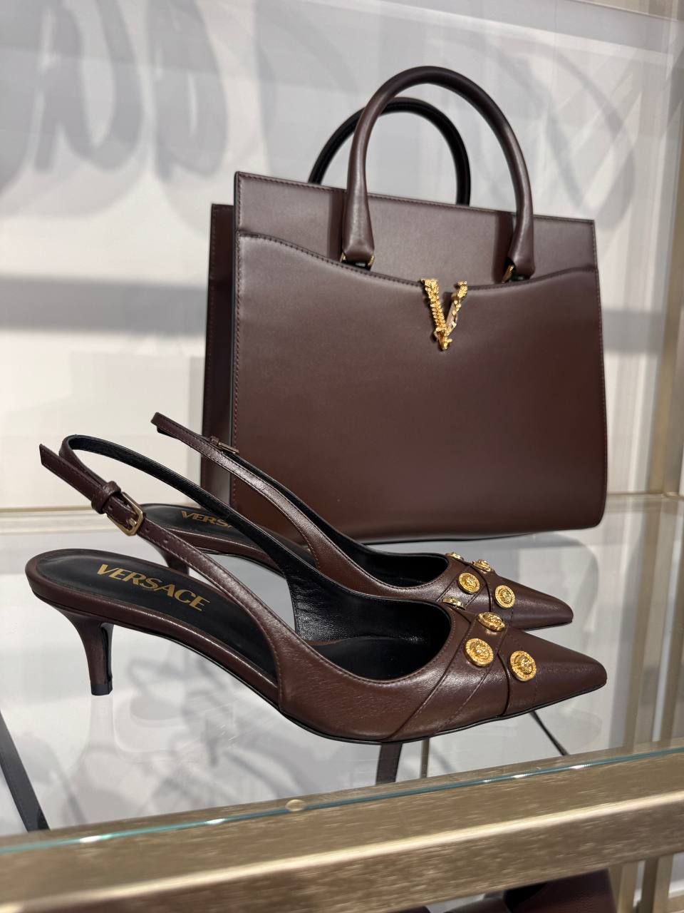 Слингбэки Versace