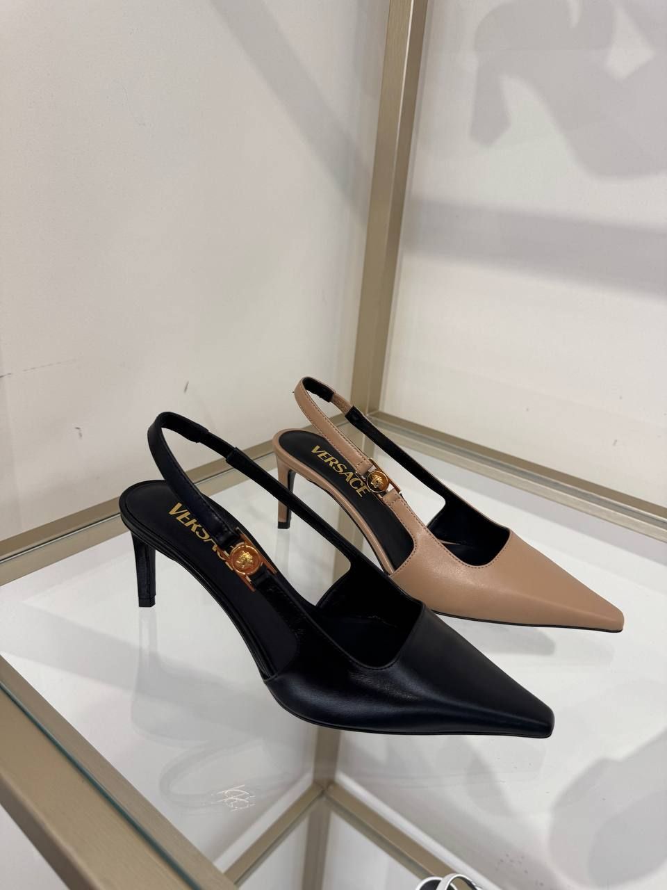 Слингбэки Versace