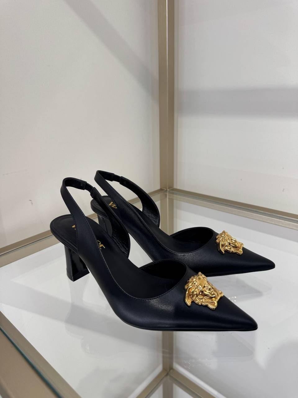 Слингбэки Versace
