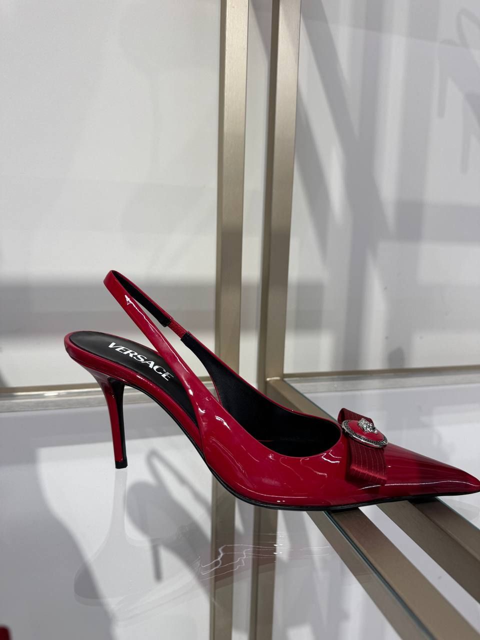 Слингбэки Versace