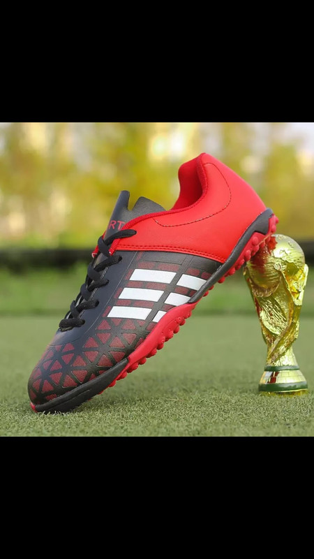 Red and black football trainers
