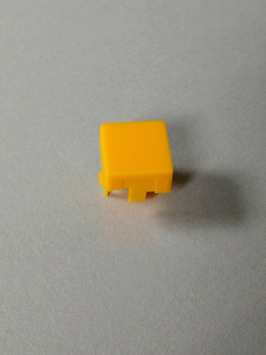 Amber cap for OFF switch on  R-60, R-17, D-70, 2600 consoles