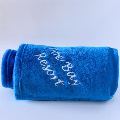 Blue Blanket with Doe Bay logo